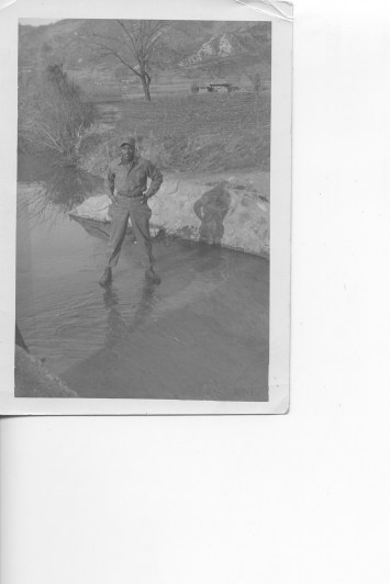 Dad standing on ice in Korea early 1950's